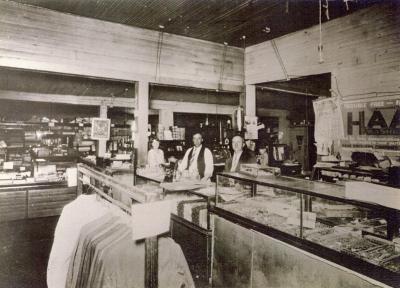 Hopkins Mercantile interior Marjorie Hopkins, Jase Ward and 
C.F. "Frank" Hopkins. 