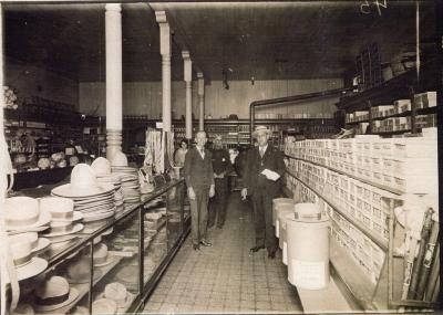 Mr. J. H. Wicecarver with store interior and drummer (salesman) 